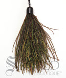 The end of the Purrfect Wispy Bouncer cat teaser toy is shown. The fine tendrils from the long tail of the Peacock reflect iridescence that your cat will love.