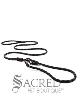 A black/grey rope leash with a metal slider and rubber stoppers, Ezydog Luca leash can be used as a "slip" leash. White background with 'SACRED PET BOUTIQUE' watermark.