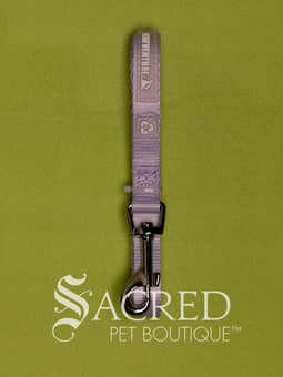 The Catventure logo and recycled image is shown on the black leash near the stainless steel snap hook end of the leash. The leash is shown looped and on a white background.
