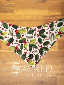 Dog wearing a purple poppy patterned ANZAC memorial bandana with 'Sacred Pet Boutique' logo.