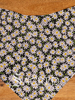 Italian greyhound dog wearing a purple poppy patterned ANZAC memorial bandana with 'Sacred Pet Boutique' watermark.