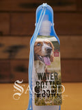 Pet water bowl with bottle attachment on a wooden surface, branded 'Sacred Pet Boutique'.