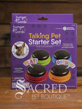 Talking Pet Starter Set packaging with buttons on a wooden surface