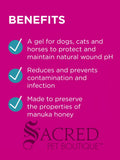 A bright pink information graphic with the heading 'BENEFITS' and three bullet points describing product benefits for pets, including a teal checkmark and white text. The Sacred Pet Boutique watermark appears at the bottom.