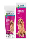 A 100g squeeze tube and matching box of Paw Pure Animal Wellness Manuka Wound Gel for pets, featuring a golden retriever dog on the packaging against a white background. A grey Sacred Pet Boutique watermark at the bottom.