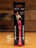A Scream puppy collar in pink with a side release clip, reflective stripe, adjustable to fit puppies that have just arrived in their new home.
