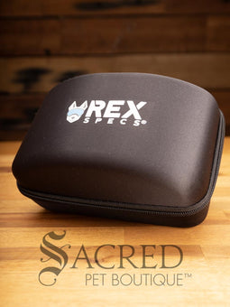 The Rex Specs Hard Case is zipped closed and keeping your Rex Specs and spare lenses safe from damage.