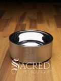A beautifully styled straight sided double walled steel bowl with brand name ZEEZ etched on the outer brushed finished edge shows the highly polished inner where the brand name is embossed on the base.