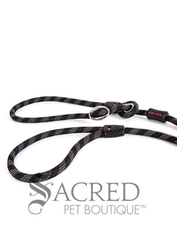 A black/grey rope leash with a metal slider and rubber stoppers, Ezydog Luca leash can be used as a "slip" leash. White background with 'SACRED PET BOUTIQUE' watermark.