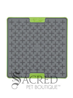 Three LickiMat Tuff Buddy mats in three different colours - orange, green and blue. They're on a white background and has a grey Sacred Pet Boutique watermark. 