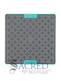 Three LickiMat Tuff Buddy mats in three different colours - orange, green and blue. They're on a white background and has a grey Sacred Pet Boutique watermark. 