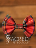 Red Tartan bow tie on a wood background