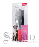 From Yours Droolly, the Shear Magic Large Double Brush is in it's packaging. The brush has one side with metal pins with red plastic ends and soft bristles on the other. With a red and grey handle. A Sacred Pet Boutique watermark in grey print.
