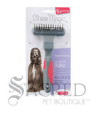 From Yours Droolly, the Shear Magic Long Coat Rake is in it's packaging showing an afghan hound. The rake has a double row of spinning teeth and a red and grey handle. A Sacred Pet Boutique watermark in grey print.